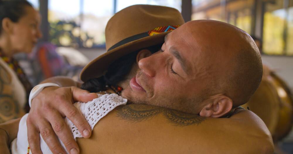 Guy Hugging Shaman